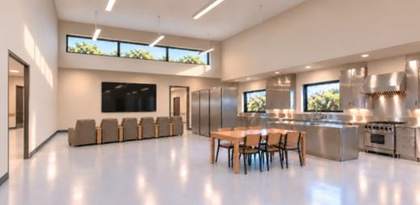 Kitchen and dining area with stainless appliances