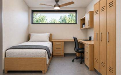 Crew dorm room with wardrobes and desk
