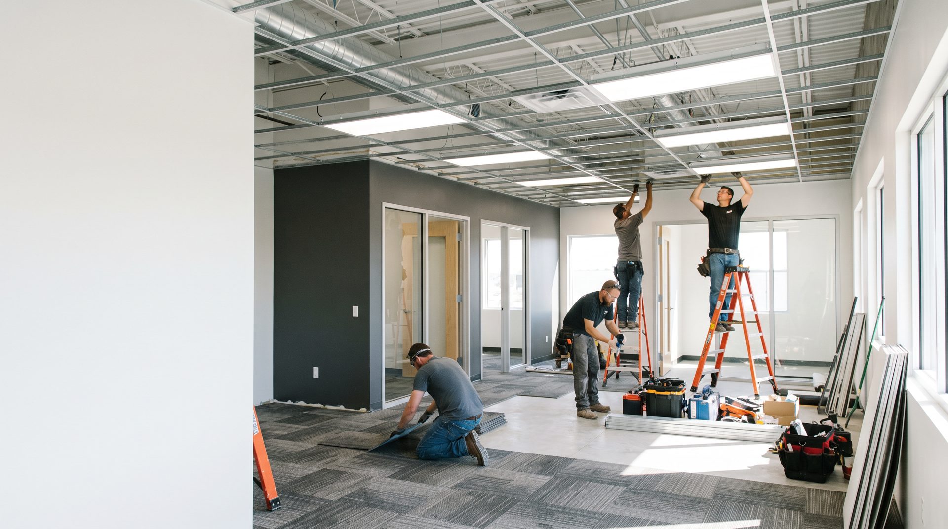 Crew remodeling the interior of a modular office building
